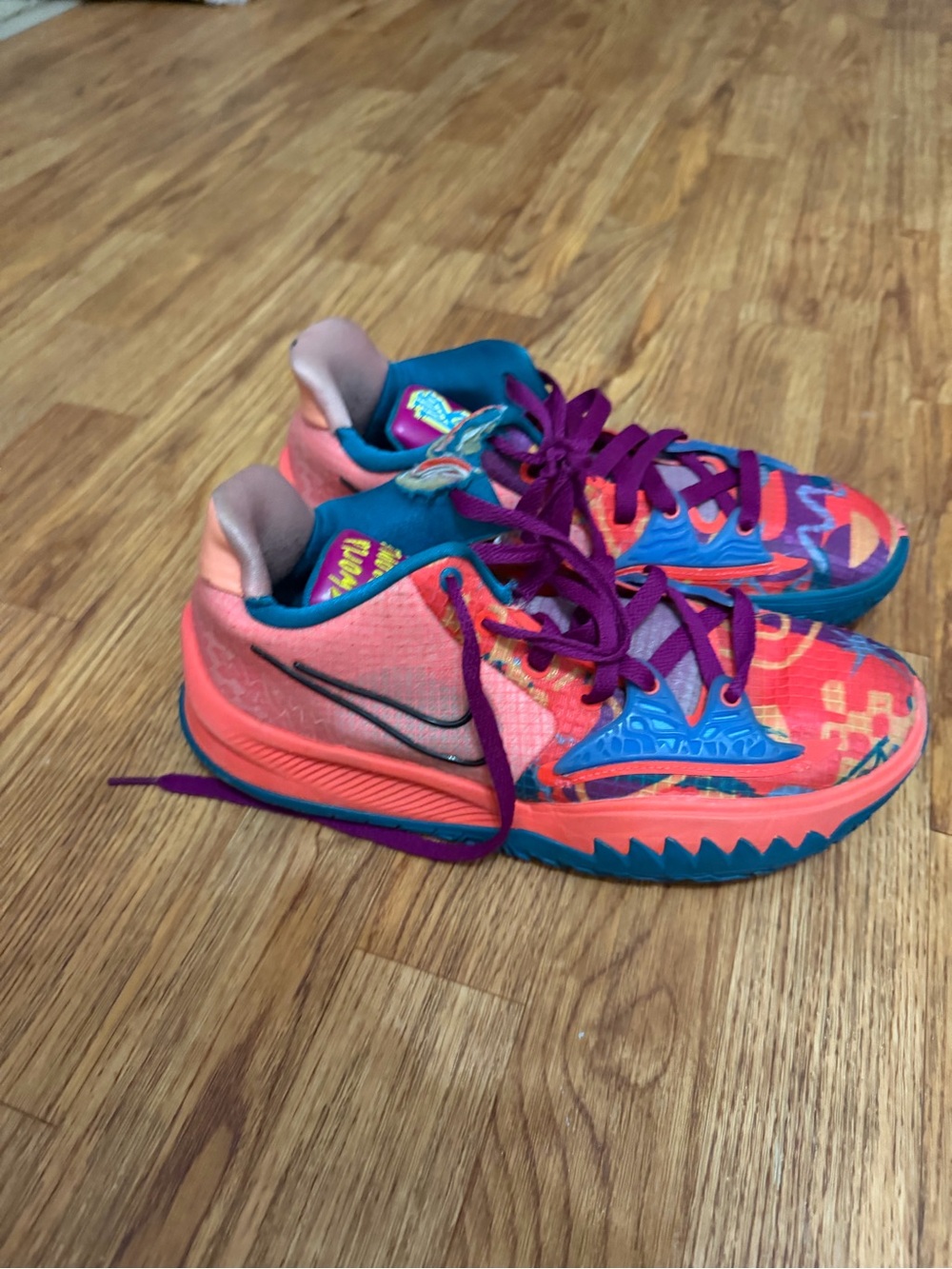 Nike Kids Bright Pink and Teal Athletic Sneakers with Purple Laces